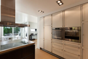 modern kitchen with floor to ceiling units