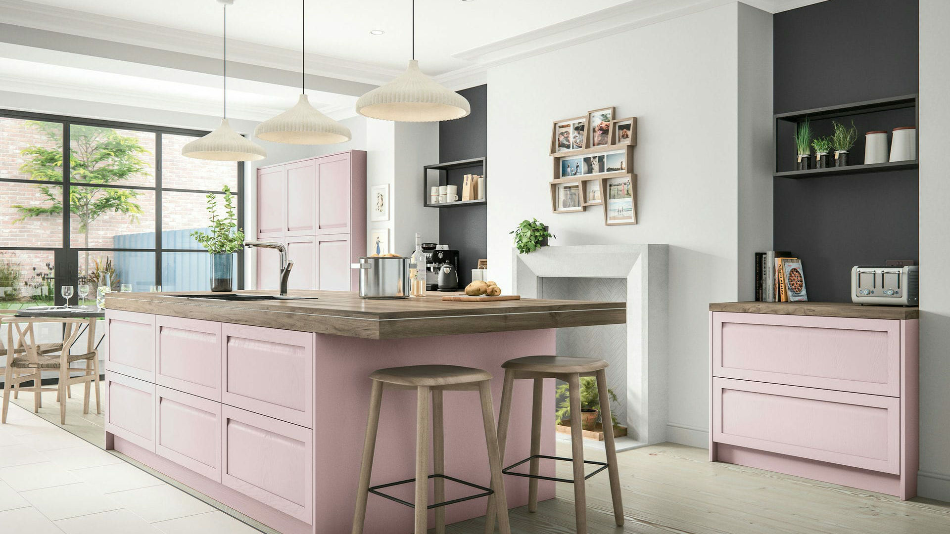 Handleless Solid Wood Vintage Pink kitchen featuring a smooth, contemporary design in a playful vintage pink finish