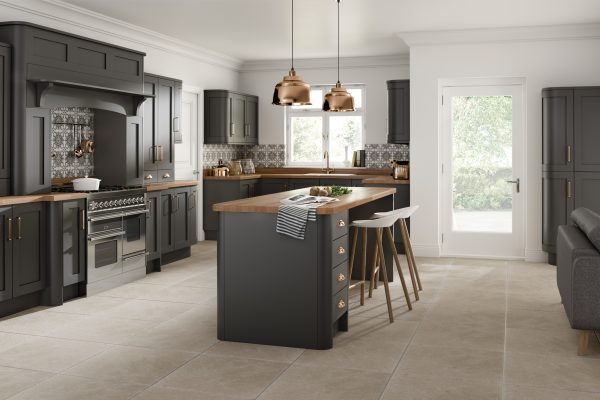 Graphite luxury shaker kitchen with warm copper accents and light worktops, blending rich tones with refined detailing.