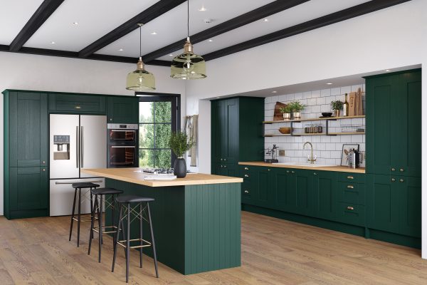 Luxurious fir green shaker kitchen with deep green cabinetry, elegant panelled doors, and light worktops for a refined, high‑end look.