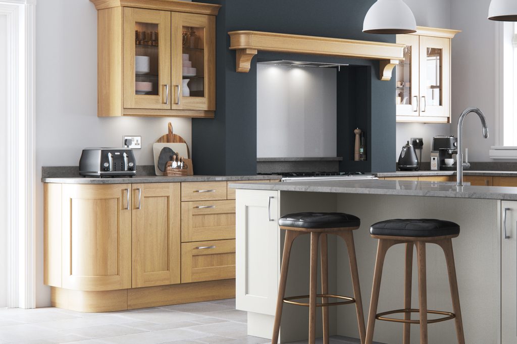 A modern kitchen with silver accents and luxurious oak units, creating a rich and inviting atmosphere with classic wood tones.