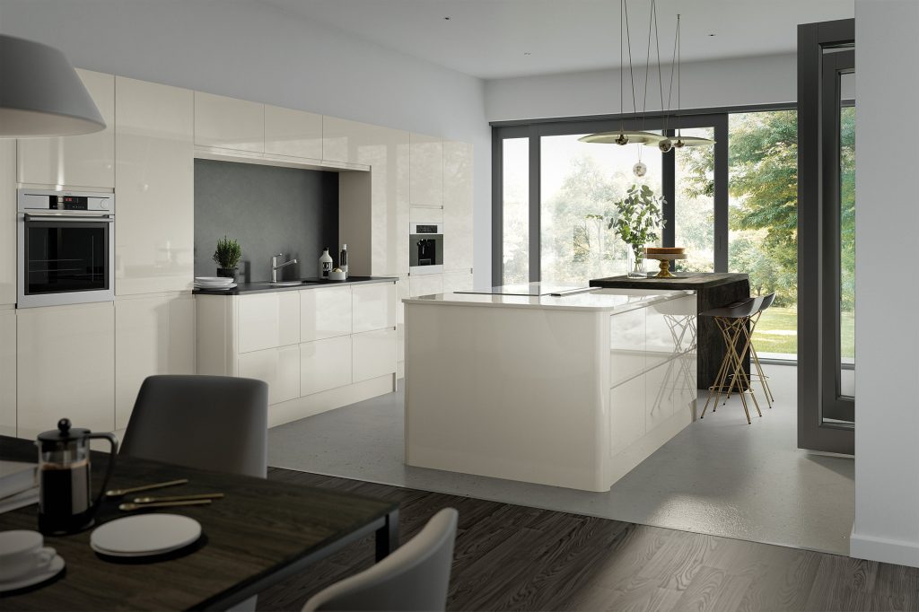 Handleless high gloss porcelain kitchen with smooth cabinets and light countertops, creating a fresh and modern look.